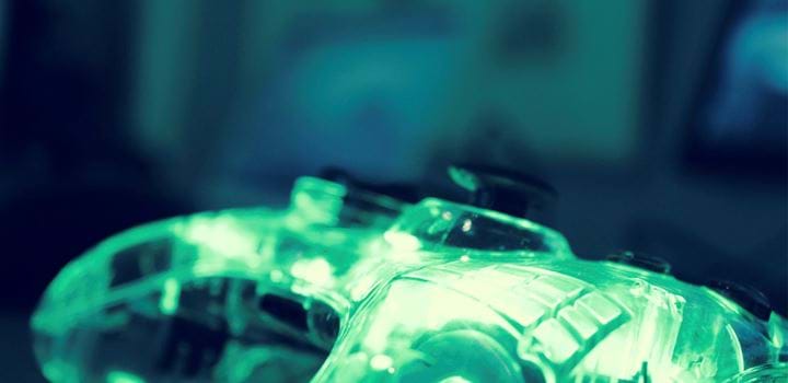 A clear Xbox 360 controller. The picture has a green tint to it.