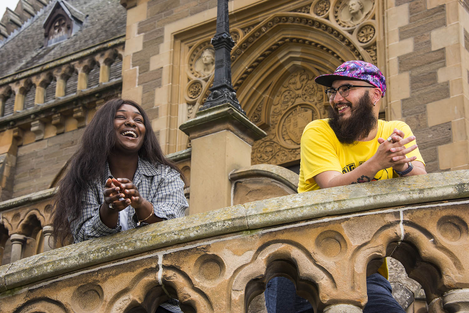 Two students chatting outside McManus Galleries