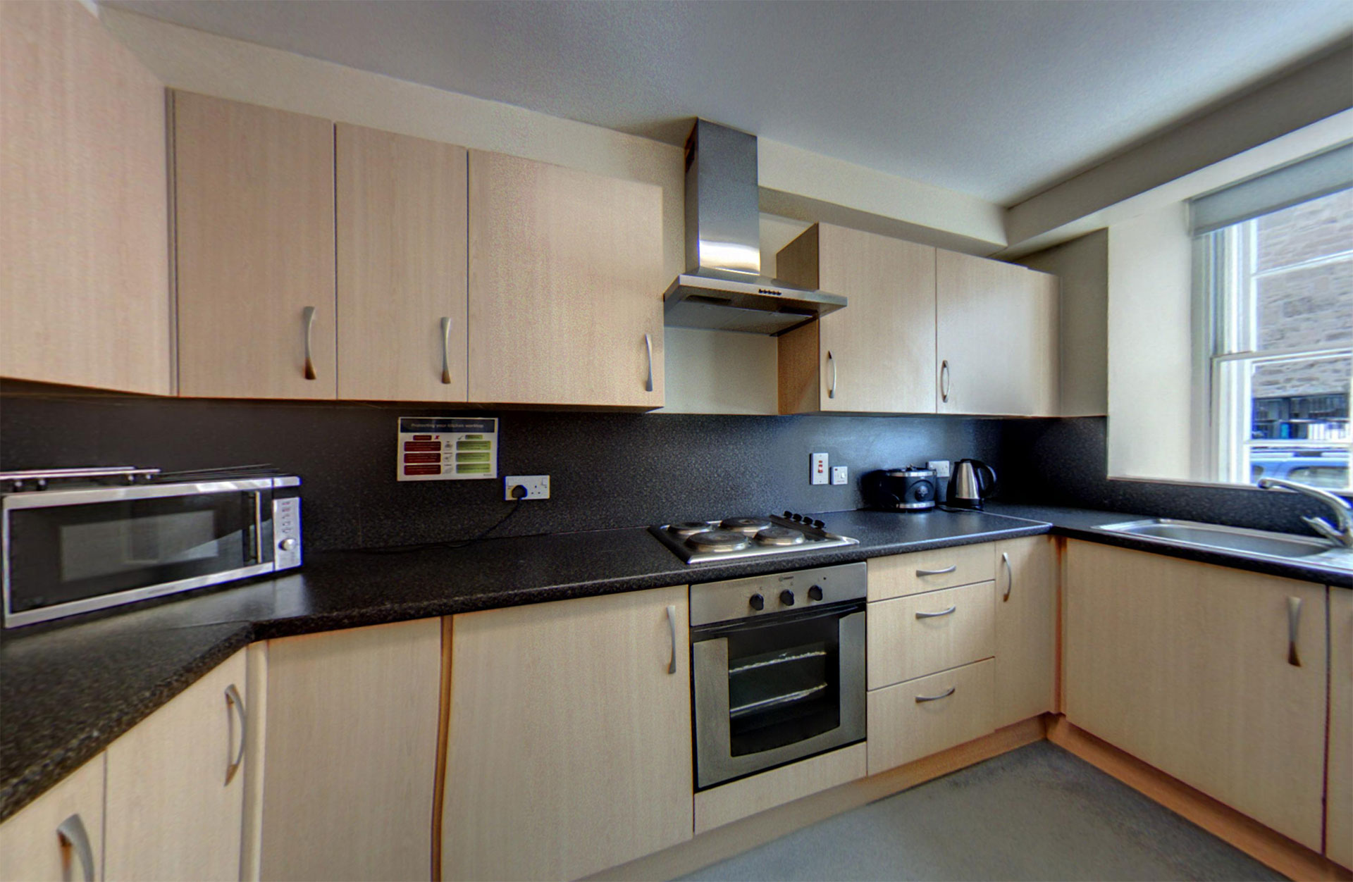 Kitchen with small appliances on worktops