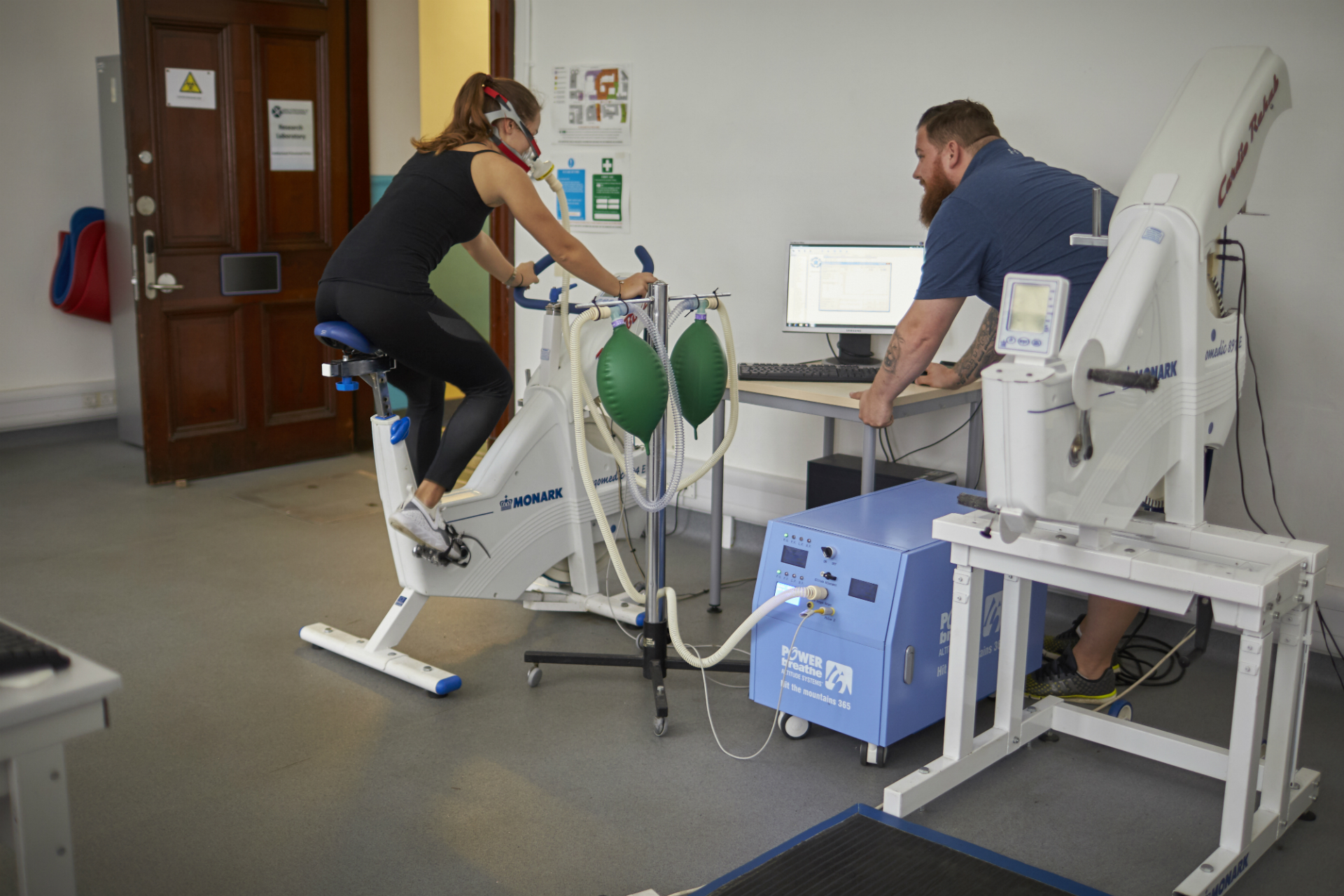 Student on treadmill in sports laboratory