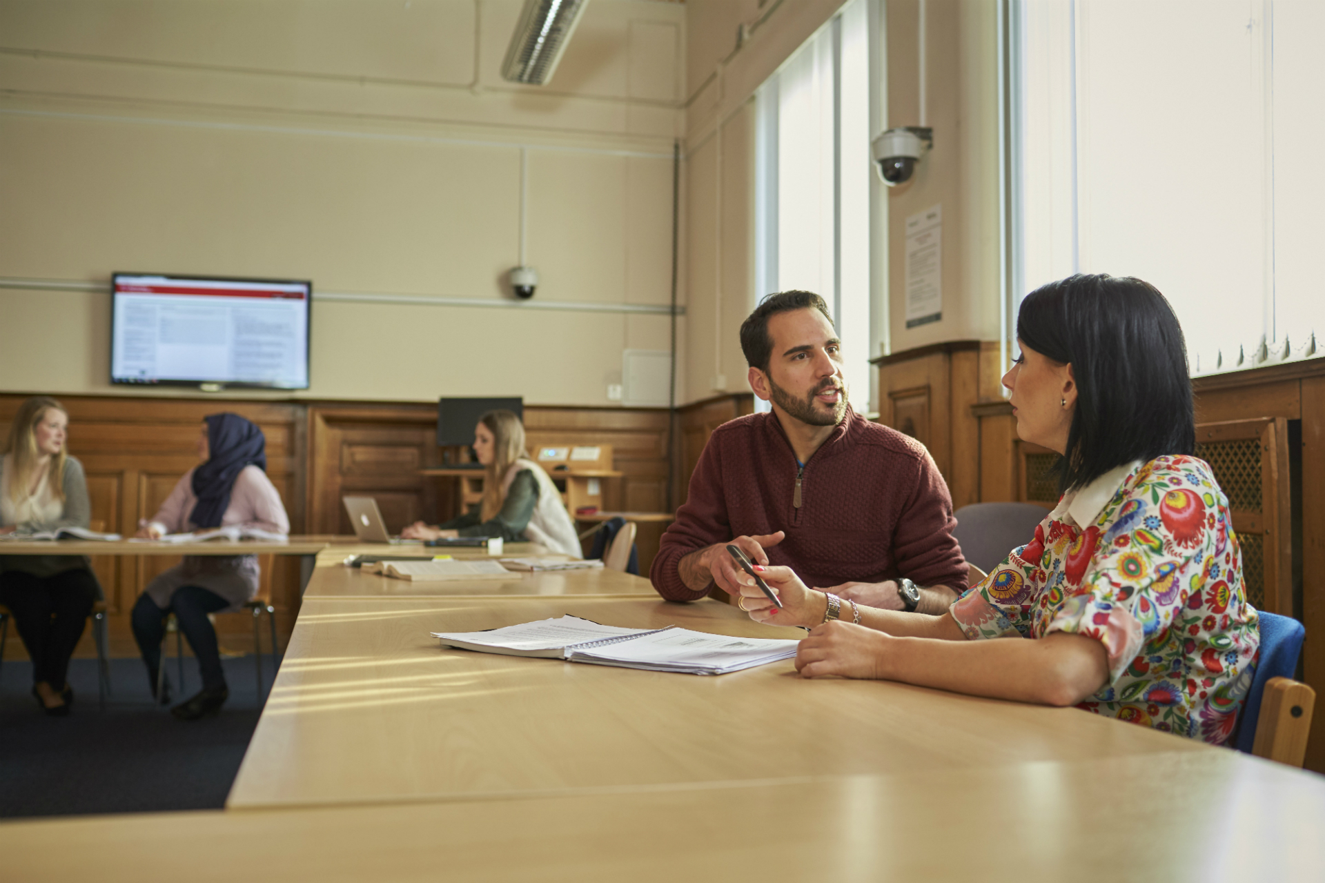 STudents chatting on campus