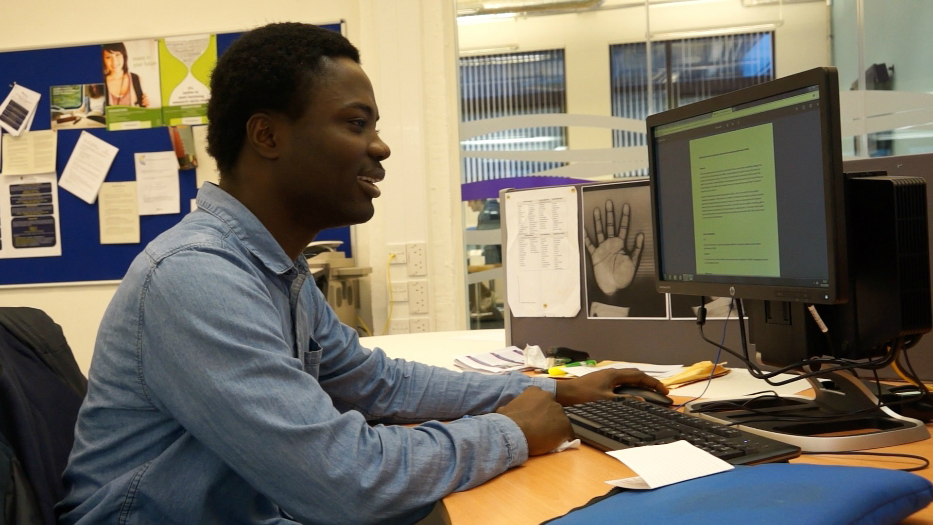 Male working on Desktop Computer