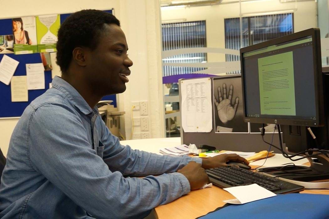 Male working on Desktop Computer