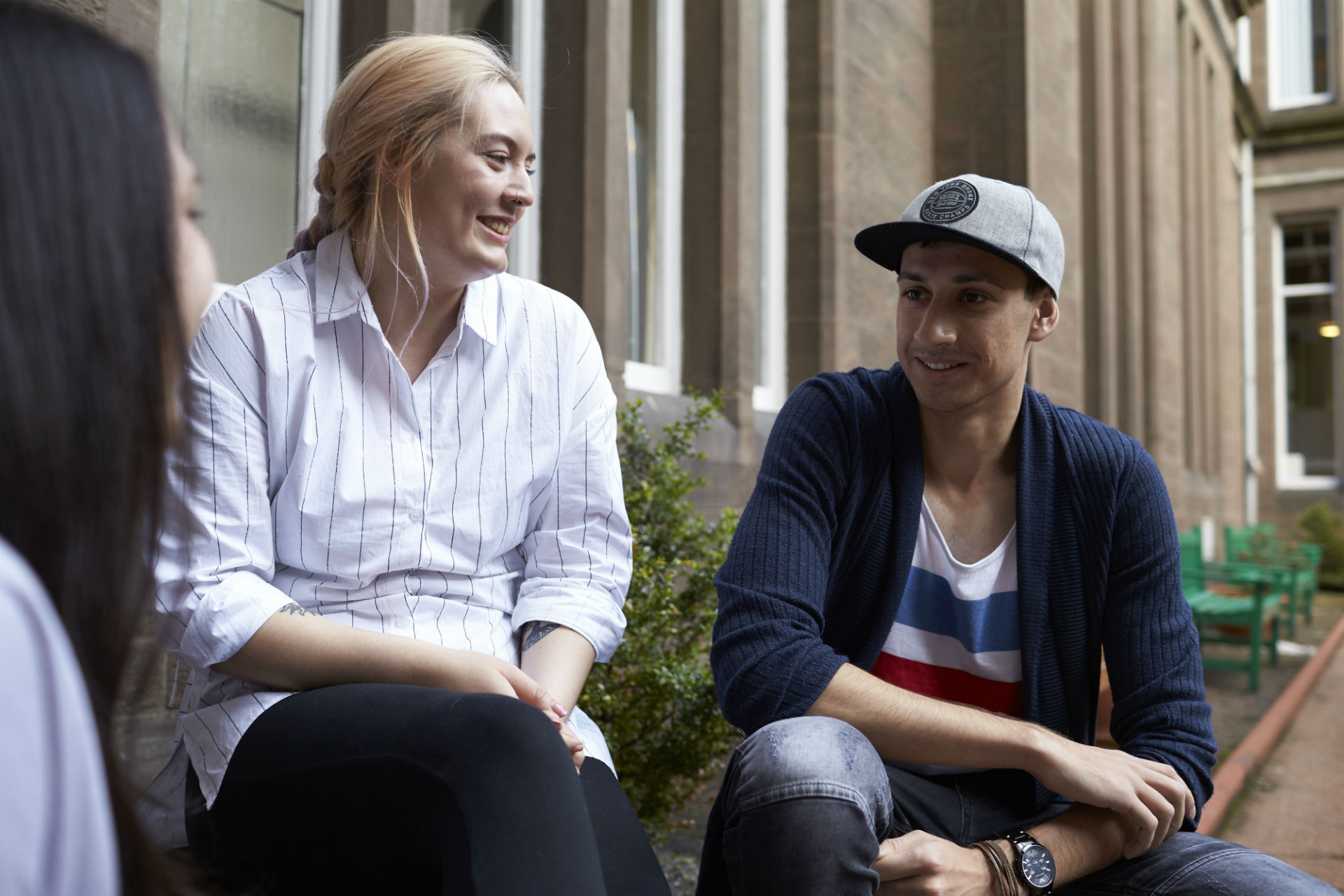 Group of people sitting chatting