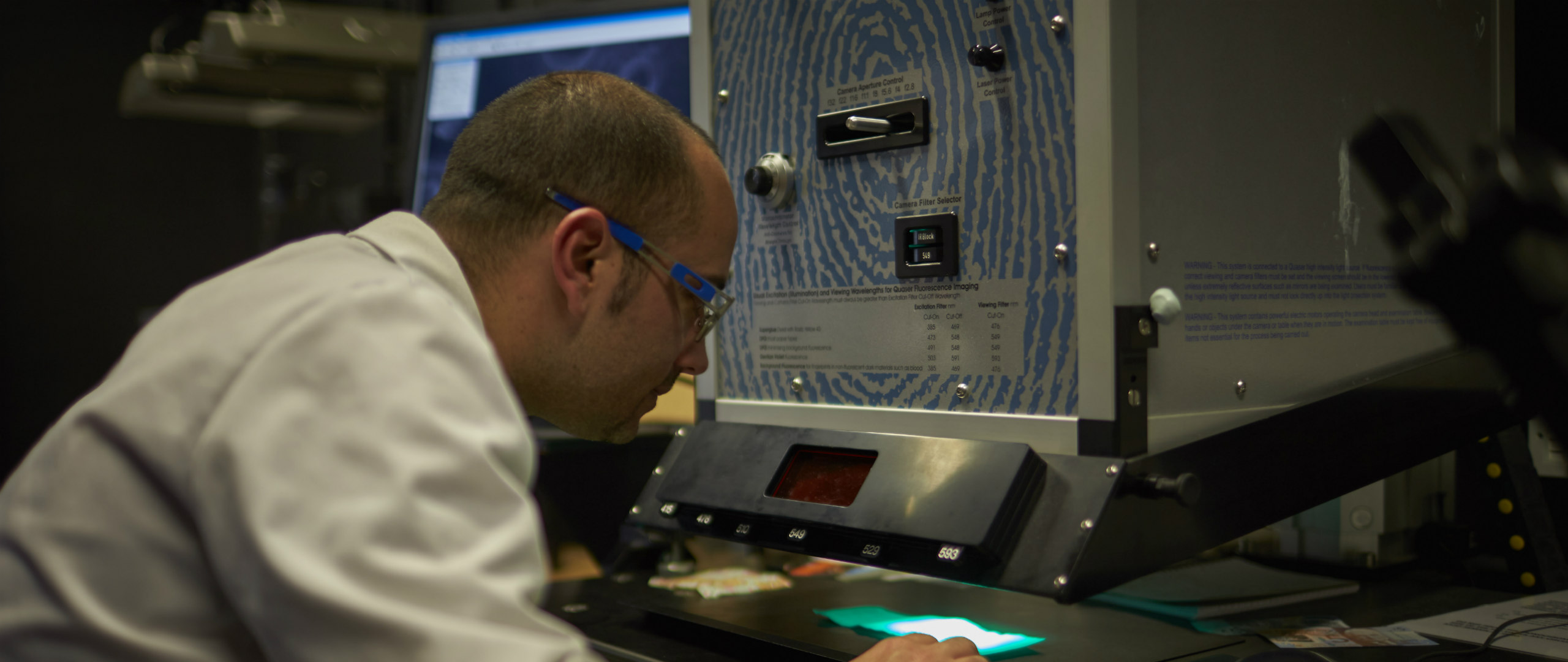 Male using laboratory equipment