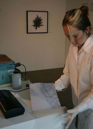 Female wearing white lab coat