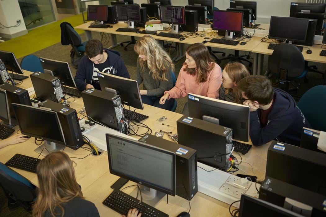 Group of students working in Abertay Universities Ethical Hacking Laboratory