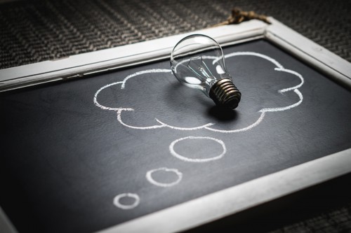 Lightbulb on a blackboard