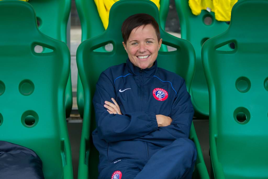 A photo of Debbi McCulloch in the dugout