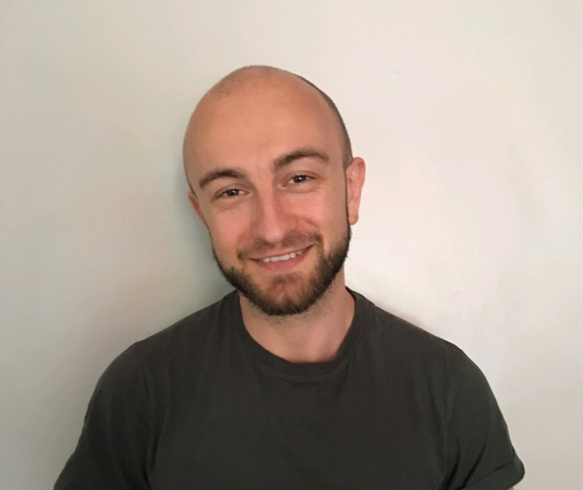 A picture of Arran Topalian smiling