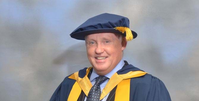 A picture of Tony Banks in his graduation outfit