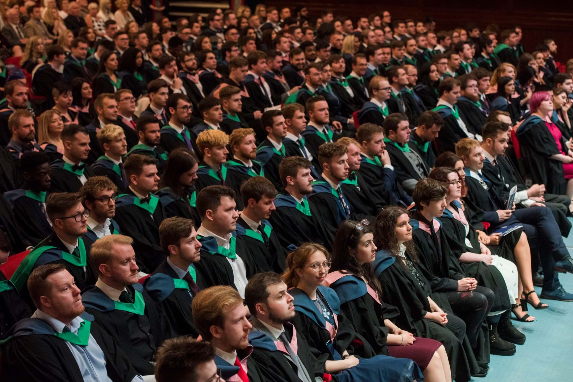 Graduands sitting in the Caird Hall