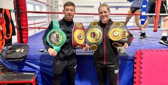 On the left Dean Sutherland holding the World Boxing Council silver title. On the right, Hannah Rankin holding the International Boxing Organisation titles
