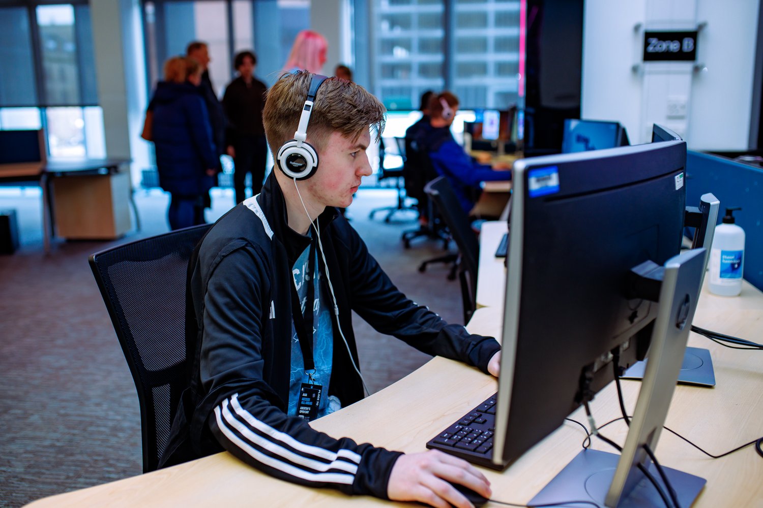 Student sitting at a computer on Open Day